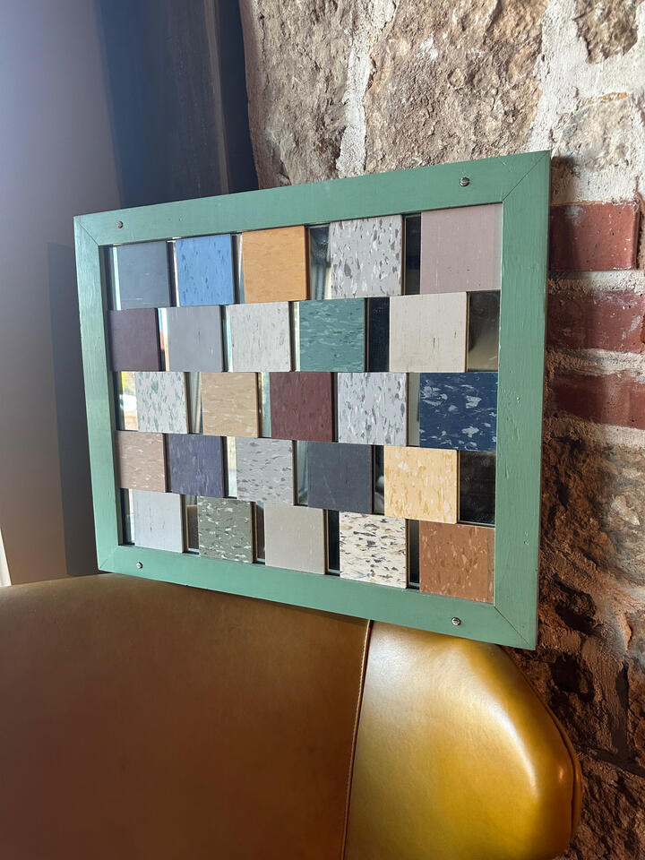 I found an old mirror in a basement and used it as the base material to make this earth tone abstract art