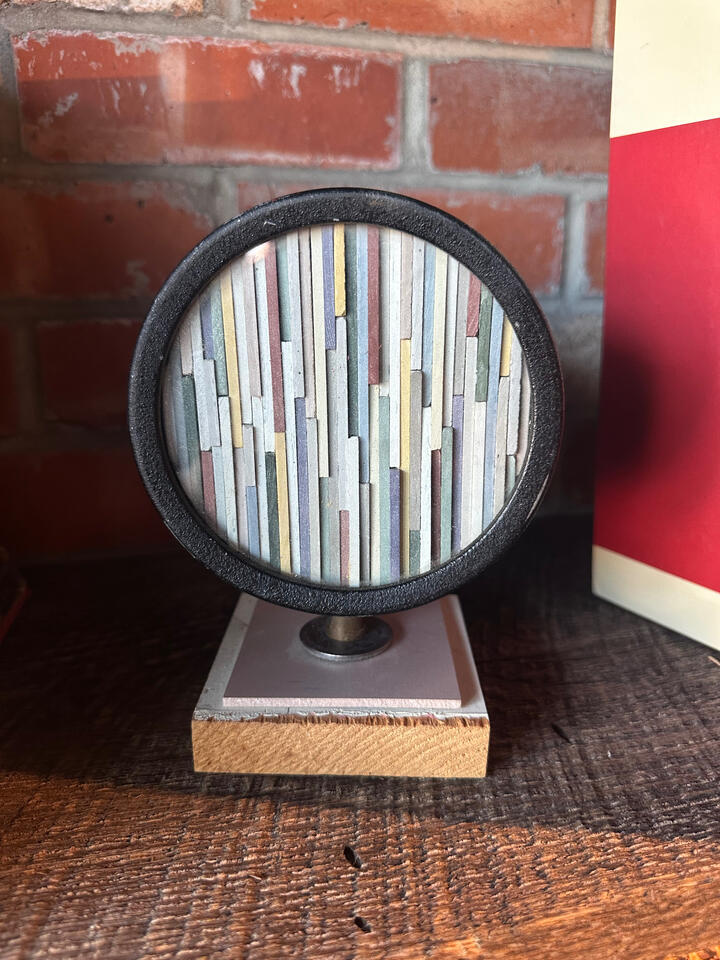 vintage pressure gauge used as a frame to house the vintage flooring samples cut up to make this beautiful textures and steampunk style art. vintage pressure gauge used as a frame to house the vintage flooring samples cut up to make this beautiful textures and steampunk style art.